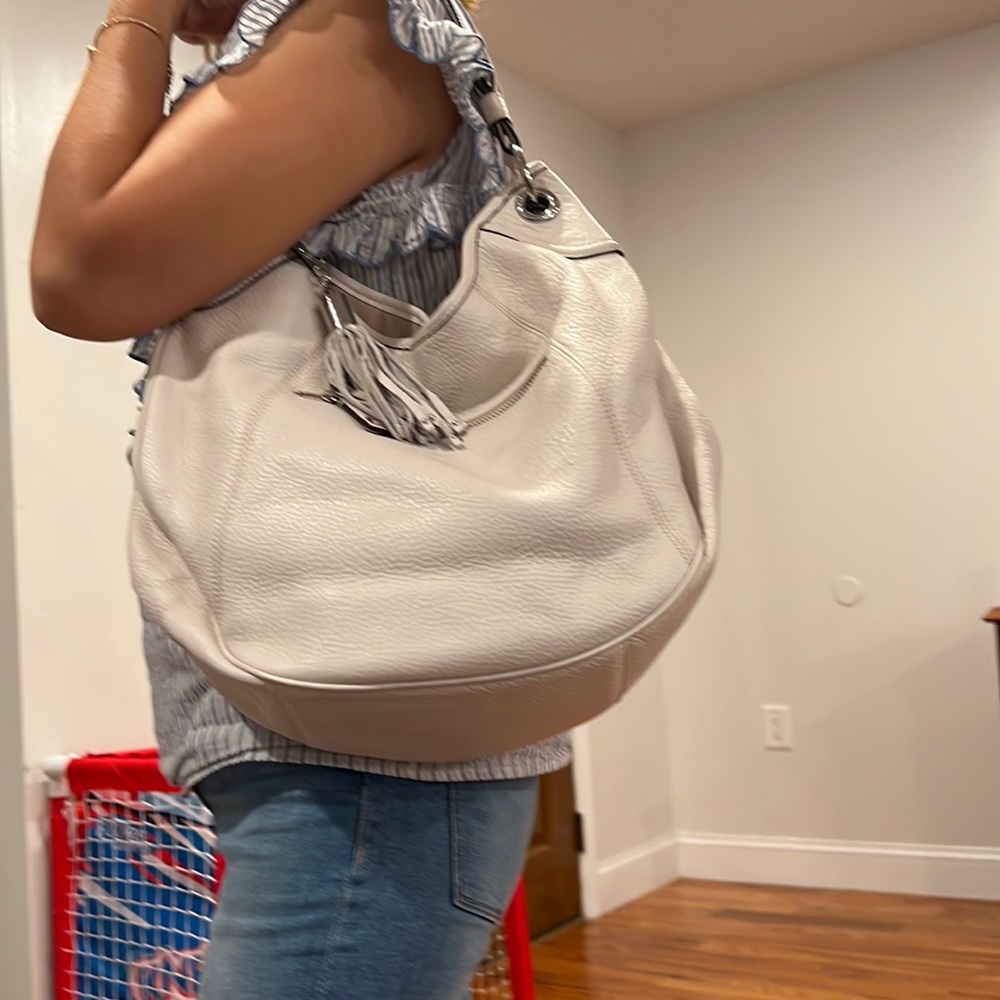 White Calvin Klein over the shoulder leather bag